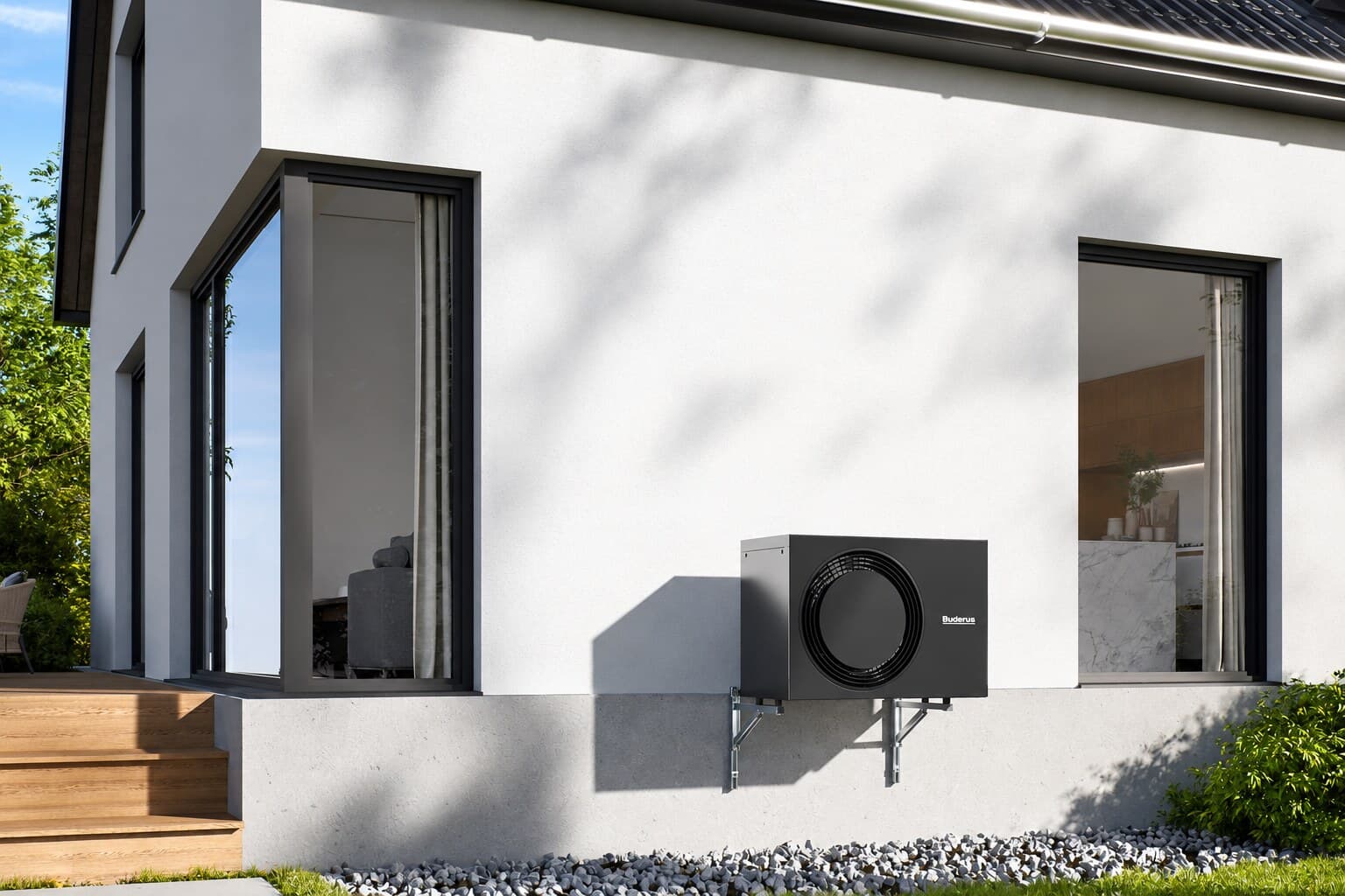 Außengerät einer Buderus-Wärmepumpe an der Wand eines modernen Hauses